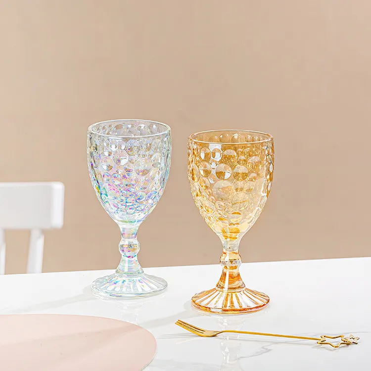 Vintage carved phoenix-tail shaped bubble-style stemmed glasses. Available in co